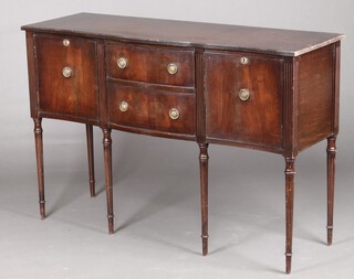 A reproduction Georgian mahogany sideboard with quarter veneered top, fitted 3 drawers flanked by cupboards, raised on turned supports 92cm h x 137cm w x 46cm d 