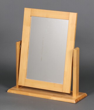 A rectangular plate dressing table mirror contained in a gilt frame 63cm x 55cm x 20cm 
