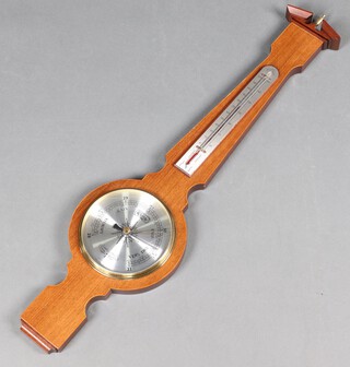 Comitti of London, a reproduction aneroid wheel barometer and thermometer in a mahogany case 80cm h 