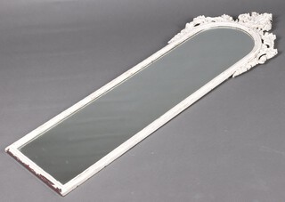 A Victorian style arched plate mirror contained in a French style pierced white resin frame with swag decoration 144cm h x 48cm d  