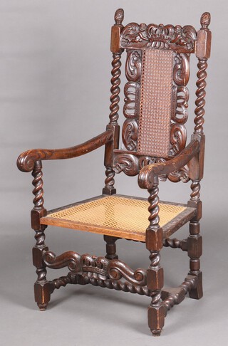A Victorian 17th Century style carved oak open arm chair with pierced cresting rail, woven cane seat and back, raised on turned and block supports with H framed stretcher  (a/f, signs of old but treated worm)