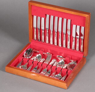 Kaniade Ltd, a 48 piece canteen of silver plated Old English pattern flatware comprising 2 serving spoons, 4 table spoons, 6 soup spoons, 6 dinner knives, 6 dinner forks, 6 small forks, 6 tea spoons, all contained in a walnut canteen 