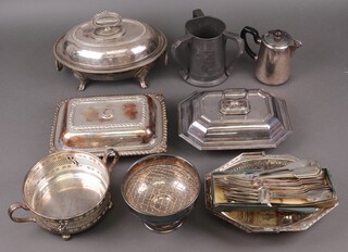 Two oval silver plated entree dishes and covers, 1 other (no handle), a cake basket with swing handle and other items of silver plate, contained in a plastic box 
