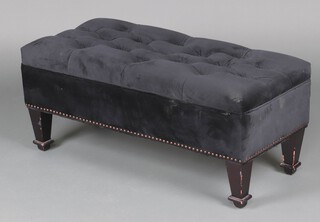 A Georgian style rectangular footstool upholstered in black suede material, raised on square tapered supports, spade feet 44cm h x 97cm w x 44cm d