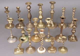 Eighteen various brass candlesticks 