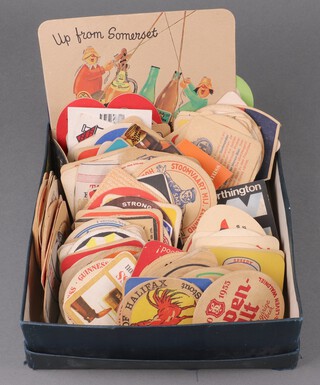 A collection of beer mats