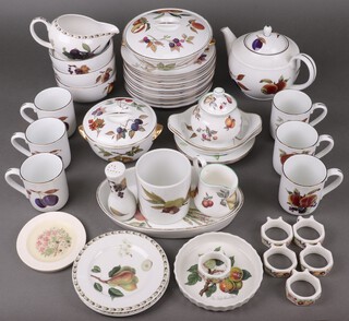 A 25 piece Royal Worcester, Evesham Gold pattern dinner service comprising 12 plates, 2 tureens and covers, teapot, 3 bowls, 2 dishes, 2 tea plates, oval dish, storage jar and pepper pot (1 plate with crack to rim, some pieces with rubbing to edges) together with a collection of other items of Worcester tableware 