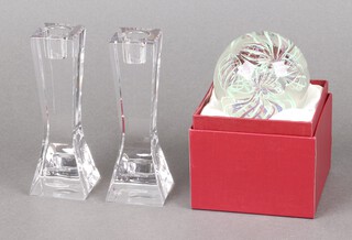 A pair of John Rocha for Waterford Crystal candlesticks 5cm and a glass paperweight 