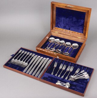 A 39 piece canteen of Viners stainless steel cutlery - 9 soup spoons, 6 dinner knives, 6 dinner forks, 6 pastry forks, 6 jam spoons and 6 teaspoons, contained in a walnut box