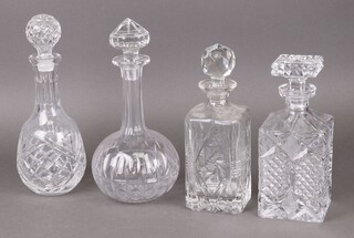 A cut glass spirit decanter, 2 club shaped decanters and a moulded glass spirit decanter