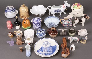 A pie lifter in the form of a bird 10cm, a reproduction cow creamer and a collection of small decorative ceramics 