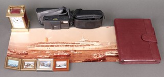 A Taylor & Bligh battery operated carriage clock, a Queen Elizabeth 2 world cruise organiser, leather bound, an Olympus AF-1 camera and a Pentax ESPIO camera, etc