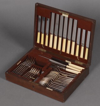 Walker & Hall, a 41 piece canteen of silver plated Old English rat tail pattern cutlery - 6 dinner knives, 6 dinner forks, 6 tea knives, 6 dessert forks, 6 dessert spoons, 2 table spoons, 5 teaspoons, pair of sugar tongs, carving knife, fork and steel, in a canteen box