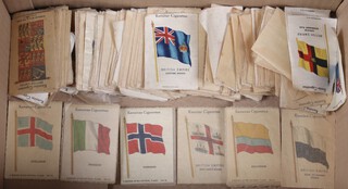 A collection of Kensitas silk cigarette cards 