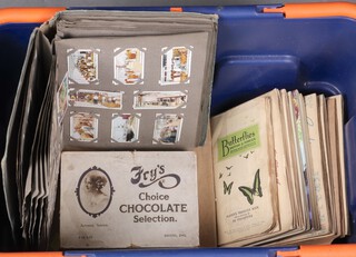 An album of Players cigarette cards, a small collection of Kensitas silk cigarette cards, contained in a blue plastic box 
