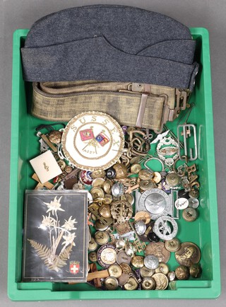 A webbing belt, a RAF side cap and a quantity of military buttons