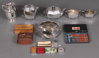 An Art Deco 4 piece silver plated tea service, a Thermos jug, a whistle and other items of silver plate, contained in a grey plastic box 