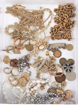 A quantity of costume jewellery including gilt metal chains, beads, bracelets, etc 