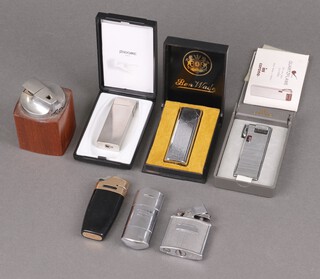 A Ben Wade lighter, a Corona lighter, a Sarome lighter boxed and a collection of other lighters 