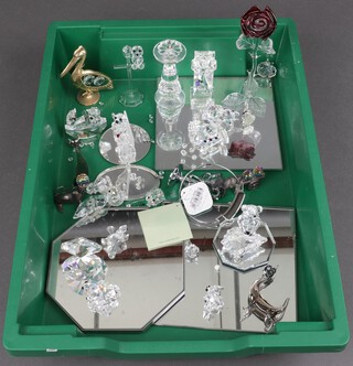 A Swarovski Crystal sun dial 10cm and a collection of other glass figures