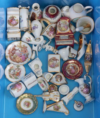 A collection of miniature Limoges items including trinket boxes in the form of a piano, vases, etc 