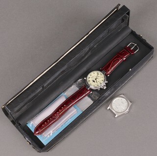 A Stauer wristwatch boxed, together with a gentleman's Seiko quartz wristwatch (no strap)