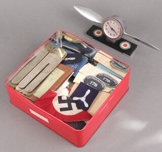 Three button sticks, an 8 day timepiece in the form of a twin bladed propeller, 4 corporal's stripes, small collection of ephemera, identity cards etc 