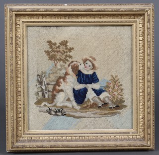 A Victorian wool work panel of a seated child with dog in a decorative gilt frame 30cm x 30cm 