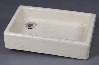 A shallow sink 14cm h x 61cm w x 41cm d 
