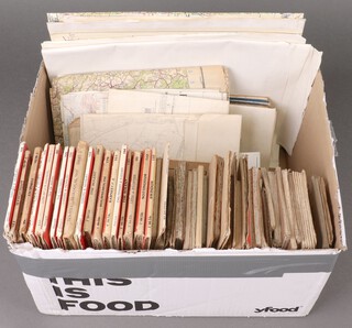 A collection of Ordnance Survey and other maps, contained in a cardboard box 