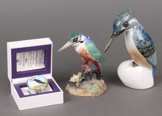 A Royal Crown Devon porcelain figure of a Kingfisher 18cm, a Czech figure of a Kingfisher 13cm and an Elliot Hall limited edition enamelled box decorated a puffin  