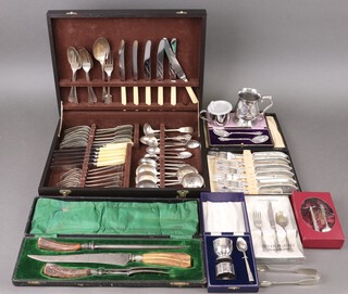 A quantity of silver plated flatware contained in a wooden canteen box, a 3 piece carving set with stag horn handles, a set of 6 silver plated fish knives and forks cased, pair of cased spoons and other flatware 