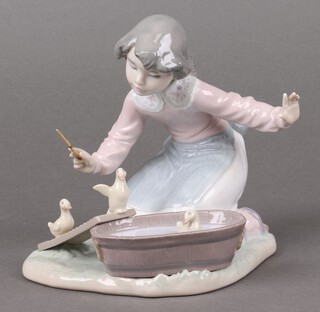 A Lladro figure - Its Your Turn 05959