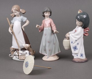 Three Lladro figures - Oriental Lantern 06231, Playful Kitten 05232 and Asian Love 06156