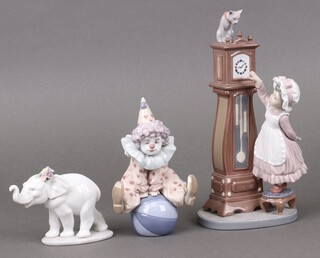 Three Lladro figures - Lucky Strolling 06460, Bedtime 05347 and Having a Ball 05813