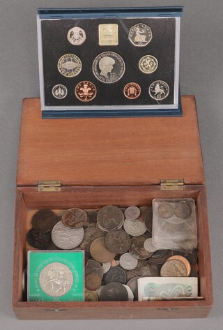 A 1999 proof set of GB coinage together with a collection of coinage contained in a mahogany box 