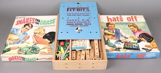 A "Fit-Bits Engineering For The Very Young" vintage wooden building boxed set, a Peter Pan Playing Snakes & Ladders Game boxed and a Hats Off game boxed 