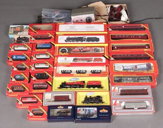 A collection of Model Railway 00 gauge to include Hornby, and earlier Hornby-Tri-ang, locomotives and rolling stock, 15 locomotives including a boxed Hornby Super Detail (R-2257) LMS 4-6-0 Class 5 with DCC, a boxed Bachman Branch Line (32-104) 08 Diesel Shunter, 3 LMS Duchess/Coronation/Patriot class locos,  rolling stock includes 4 LMS carriages and a further 22 wagons including a boxed set of Hornby R.6308 3-plank wagons