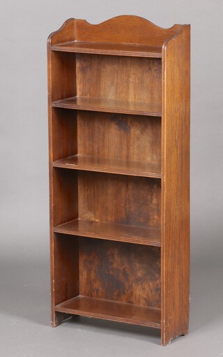 A 1930's oak 5 tier bookcase with arch shaped back 109cm h x 46cm w x 17cm d 