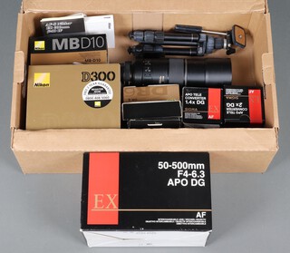Cameras - A Nikon D300 camera (boxed) with shutter count - 67855,  together with boxed accessories, battery pack MBD10, 2 Sigma teleconverters - 1.4X and 2XDGT,  right angle view finder DR-6, 2 extra lenses to include Sigma 50-500mm F4-6.3 APO DG (boxed), a Nikon AF-S Nikkor ED 300mm f/4D IF (unboxed), with 5 compact flash cards