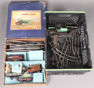 A Hornby O gauge Goods train set boxed, comprising locomotive, LMS locomotive tender and rolling stock, together with a Hornby clockwork locomotive 