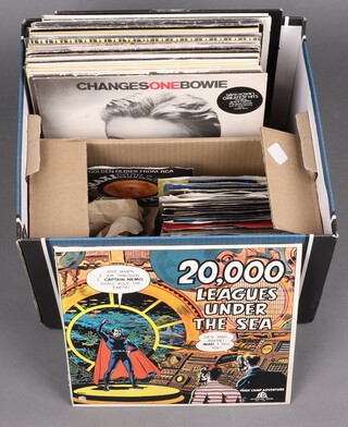 A collection of 33rpm album records to include - Skids, Thin Lizzy, Black Sabbath, Pink Floyd, Rainbow, Earl Hines, Kraftwerk, Roxy Music, The Alan Parsons Project, Tubeway Army, Hawkwind, Lynyrd Skynrd, The Beat, Specials, David Bowie, Genesis, Ultravox, Saxon, Madness, AC/DC etc, and a collection of 45rpm single records by similar artists