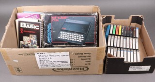 A Sinclair ZX81 personal computer, boxed, together with 33 cassette tapes, 8 books, a Joystick and other accessories