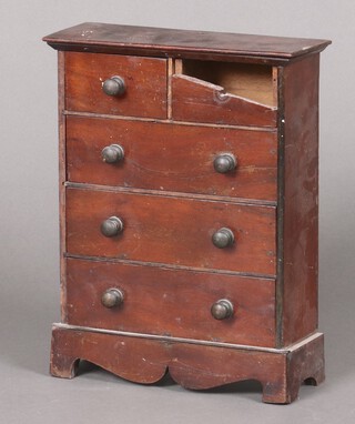 A 19th Century mahogany apprentice chest of 2 short and 3 long drawers with brass handles, raised on bracket feet 39cm h x 30cm w x 11cm d (section of timber missing to top right short drawer) 