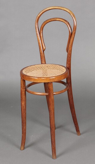 A child's thonet style bentwood chair with woven cane seat (damage to rail)  