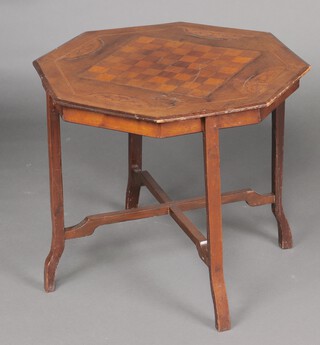 An Edwardian octagonal inlaid mahogany table, the top inlaid a chessboard, raised on shaped supports with X framed stretcher 57cm h x 64cm 