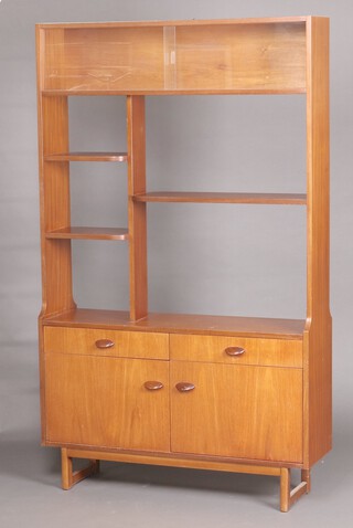 A teak mid-century room divider, fitted and arranged of cupboards, drawers and recesses, 178cm h x 106cm w x 31cm d   