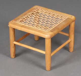 A square oak stool with woven cane seat 24cm h x 29cm 