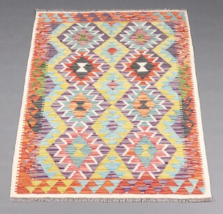A green, white and turquoise ground Kilim rug 144cm x 104cm