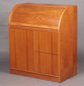 A mid-century teak and laminate cylinder bureau with fitted interior, the base fitted cupboard enclosed by panelled door and 2 drawers 99cm h x 86cm w x 47cm d  